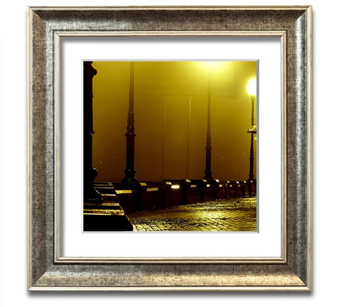 Alley Night Square Framed Print showcasing a serene alley scene, elegantly framed in multiple color options, ready to hang.