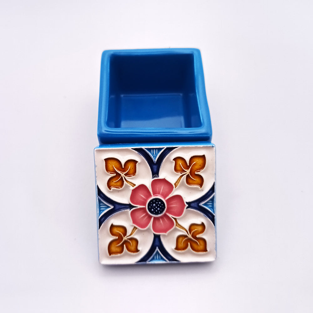 A beautifully handcrafted Alfama Ceramic Box with intricate hand-painted designs, showcasing vibrant colors and cultural heritage.