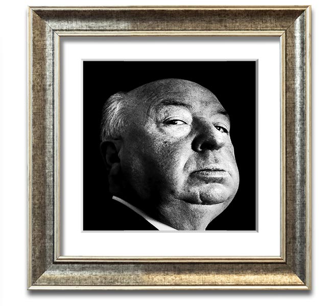 A square framed print of Alfred Hitchcock, showcasing his iconic profile in a stylish frame, available in various colors.