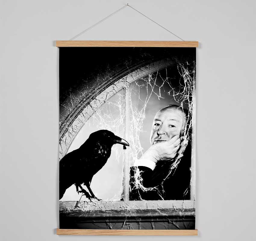 Elegant wooden poster hangers displaying Alfred Hitchcock's The Birds, featuring magnetic fastening and available in black, white, and natural oak.