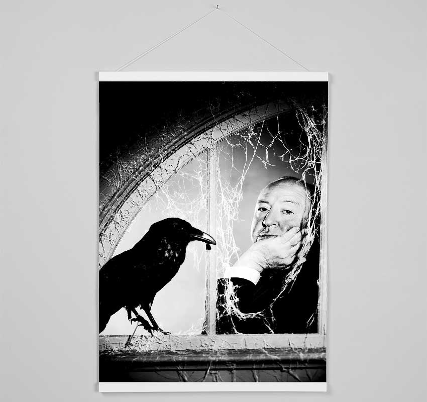 Elegant wooden poster hangers displaying Alfred Hitchcock's The Birds, featuring magnetic fastening and available in black, white, and natural oak.