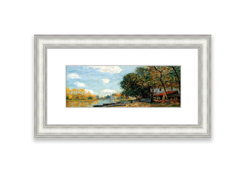 Framed print of Alfred Sisley's 'Moret On The Banks Of The River Loing', showcasing serene river landscape in vibrant colors.