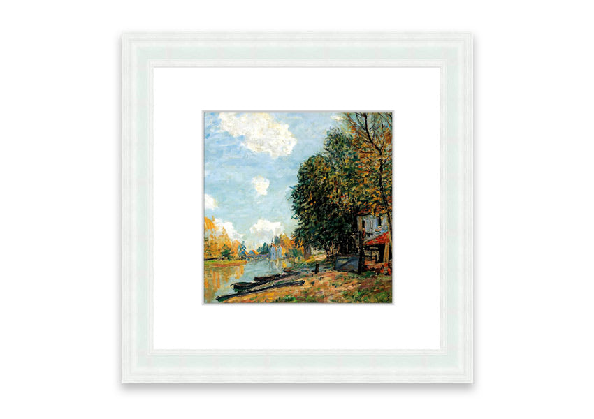 Framed print of Alfred Sisley's 'Moret On The Banks Of The River Loing', showcasing serene river landscape in vibrant colors.