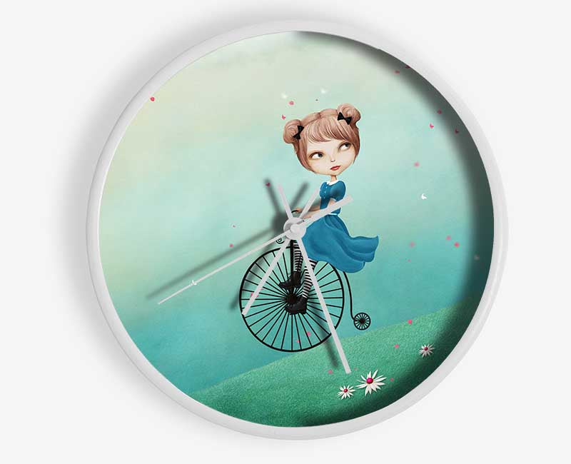 Alice In Wonderland Penny Farthing clock made of natural bamboo with a round face and clear Plexiglas lens, available in black, white, and natural frame colors.