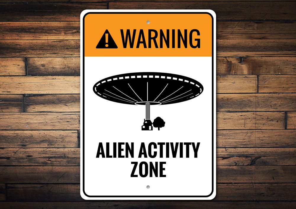 A colorful Alien Activity Zone Sign made of durable aluminum, featuring playful alien graphics, perfect for children's rooms.