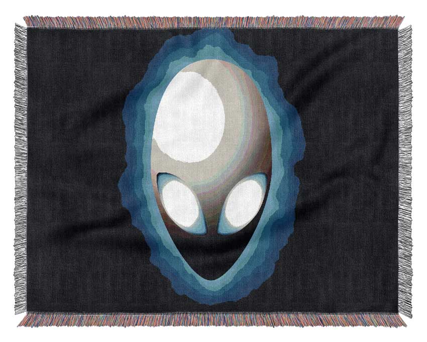 Luxurious Alien Face Blue throw blanket made from 100% cotton, featuring a unique alien face design in a rich blue color.