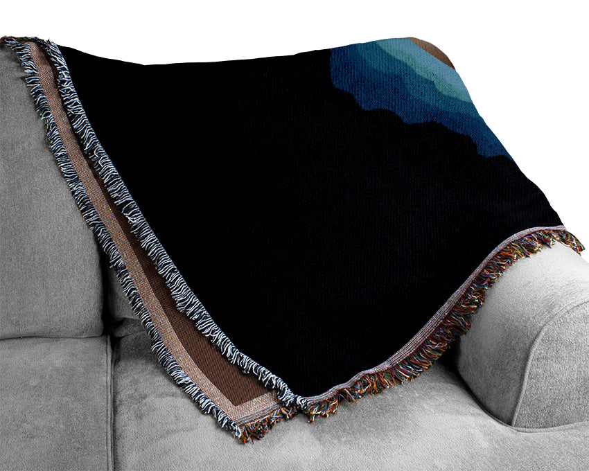 Luxurious Alien Face Blue throw blanket made from 100% cotton, featuring a unique alien face design in a rich blue color.