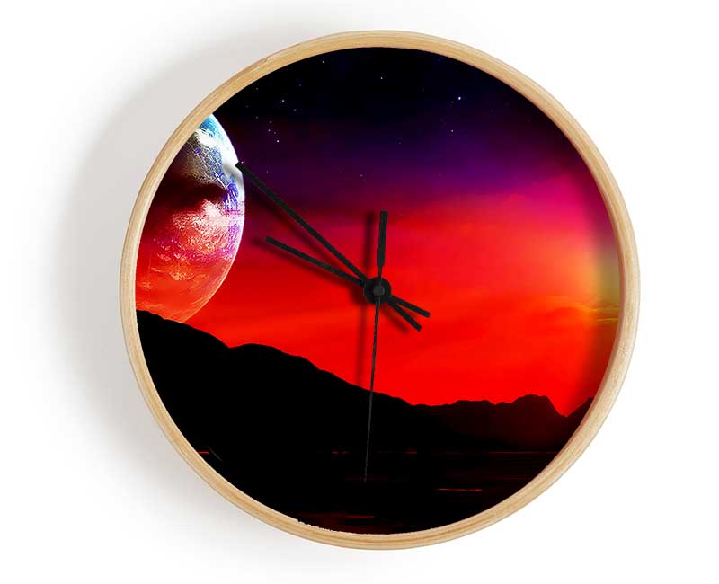 Aliens Planet clock made from natural bamboo with a round face, available in black, white, and natural frame colors.