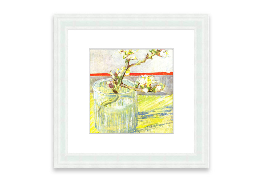 Framed print of Van Gogh's Almond Blossom Branch, showcasing delicate white and pink flowers against a blue background.