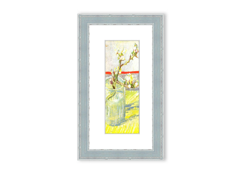 Framed print of Van Gogh's Almond Blossom Branch, showcasing delicate white and pink flowers against a blue background.