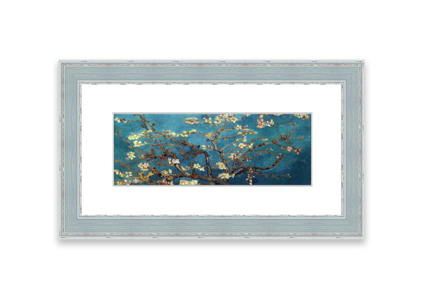 Framed print of almond branches, elegantly displayed in a stylish frame, showcasing intricate details and soft colors.