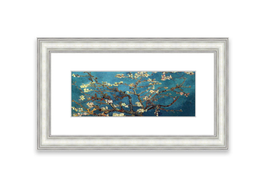 Framed print of almond branches, elegantly displayed in a stylish frame, showcasing intricate details and soft colors.