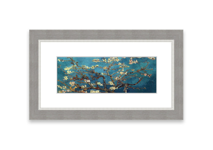 Framed print of almond branches, elegantly displayed in a stylish frame, showcasing intricate details and soft colors.