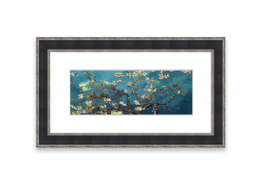 Framed print of almond branches, elegantly displayed in a stylish frame, showcasing intricate details and soft colors.