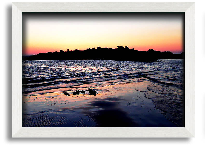 A beautifully framed print titled 'Along The Coast', showcasing serene coastal scenery, available in various frame colours.