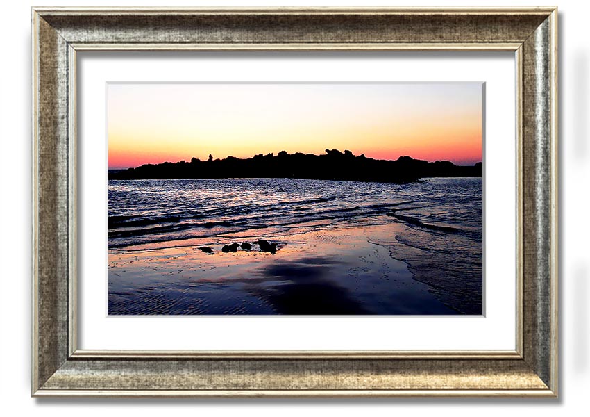 A beautifully framed print titled 'Along The Coast', showcasing serene coastal scenery, available in various frame colours.