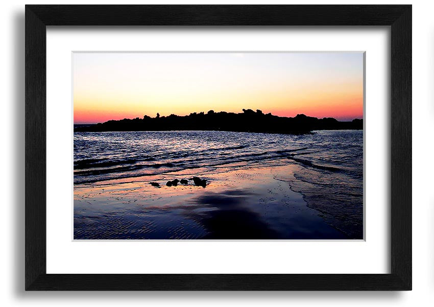 A beautifully framed print titled 'Along The Coast', showcasing serene coastal scenery, available in various frame colours.