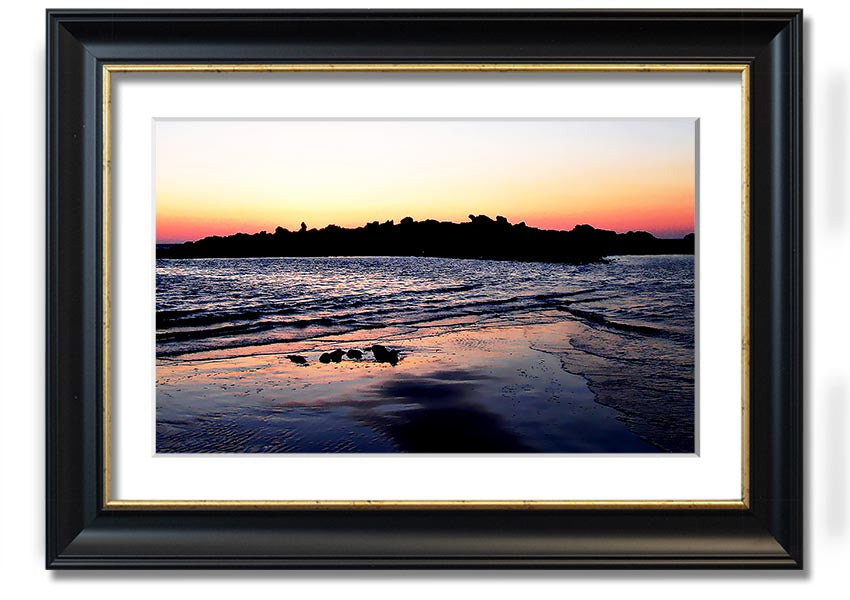 A beautifully framed print titled 'Along The Coast', showcasing serene coastal scenery, available in various frame colours.