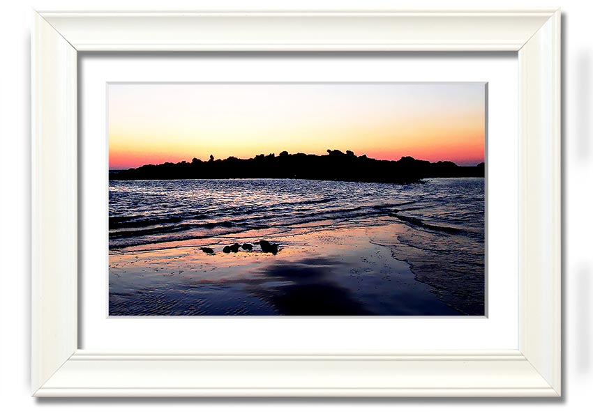 A beautifully framed print titled 'Along The Coast', showcasing serene coastal scenery, available in various frame colours.