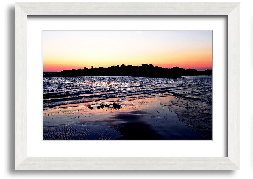 A beautifully framed print titled 'Along The Coast', showcasing serene coastal scenery, available in various frame colours.