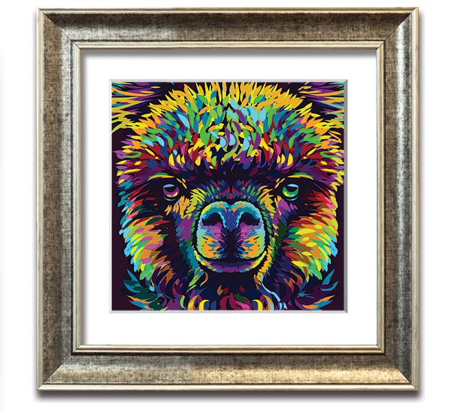 A vibrant square framed print featuring a colorful alpaca design, handmade in the UK, displayed in a stylish frame.