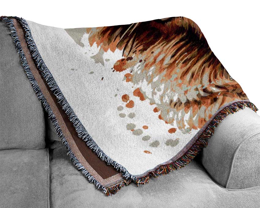 A luxurious 100% cotton throw blanket in a thermal weave, perfect for adding comfort and style to any interior setting.