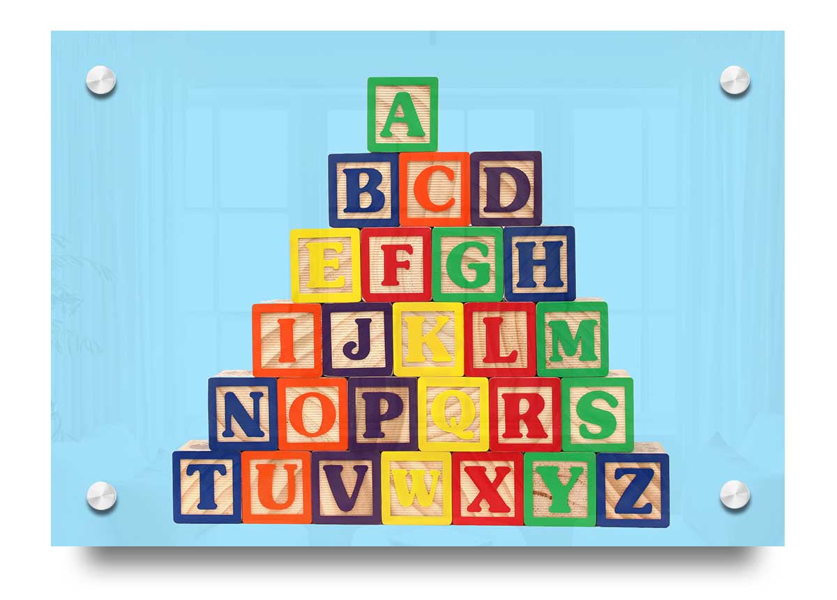 Alphabet Blocks Baby Blue acrylic print featuring colorful letters on a soothing blue background, perfect for nursery decor.