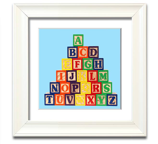 A square framed print featuring baby blue alphabet blocks, perfect for nursery decor.