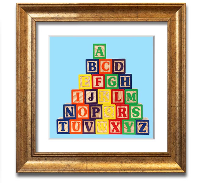 A square framed print featuring baby blue alphabet blocks, perfect for nursery decor.