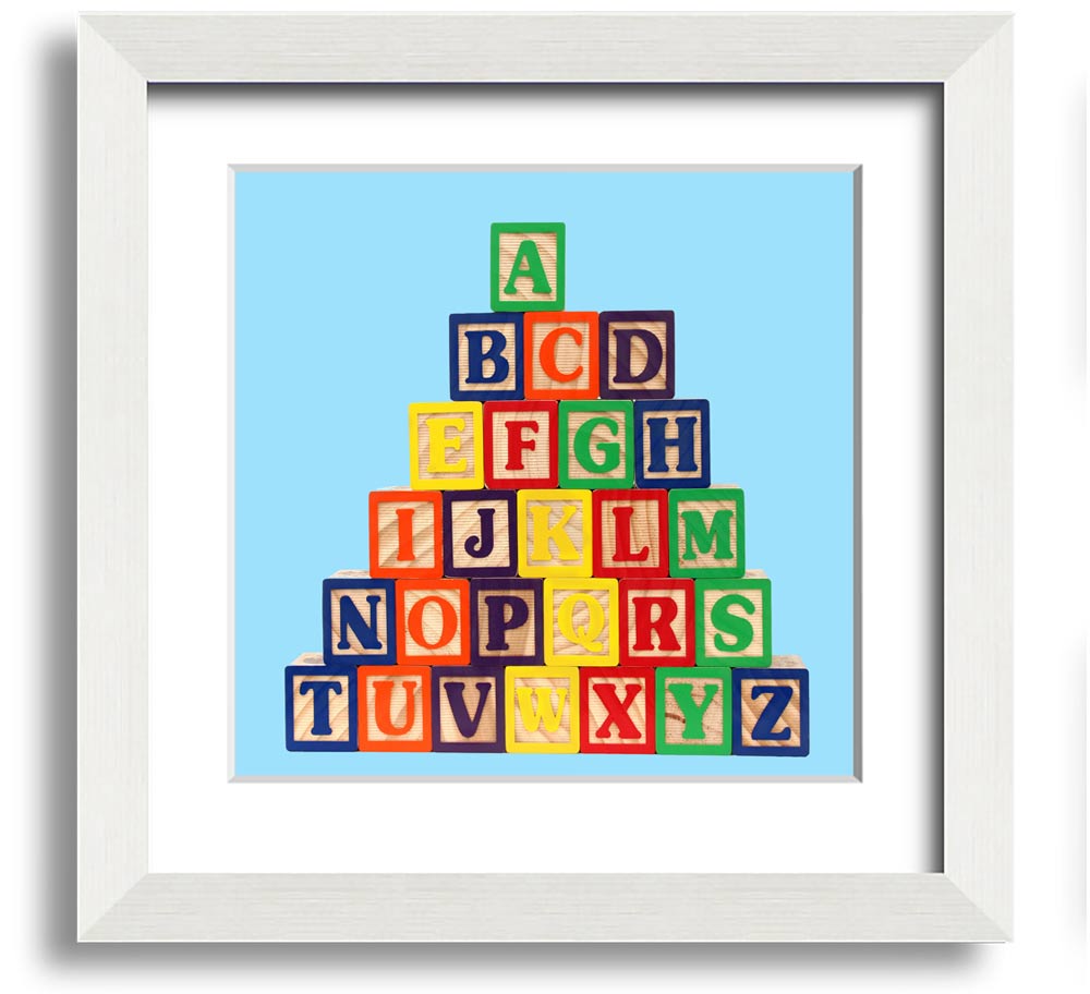 A square framed print featuring baby blue alphabet blocks, perfect for nursery decor.