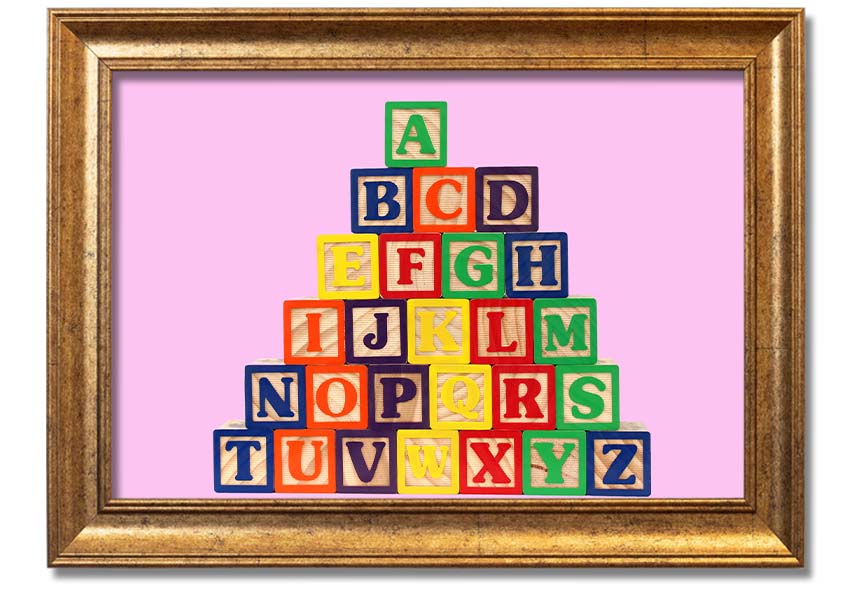 A charming pink framed print featuring colorful alphabet blocks, perfect for nursery decor.