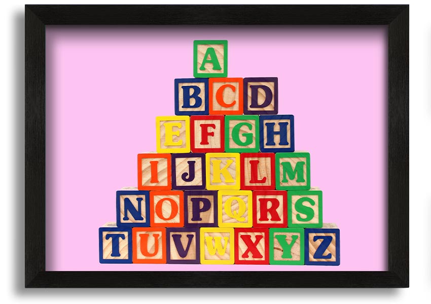 A charming pink framed print featuring colorful alphabet blocks, perfect for nursery decor.