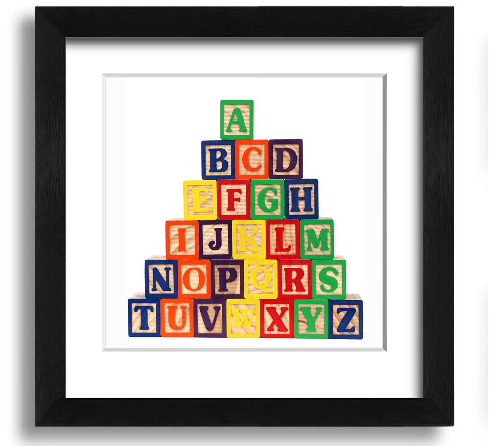 A stylish white framed print featuring colorful alphabet blocks, perfect for children's decor.