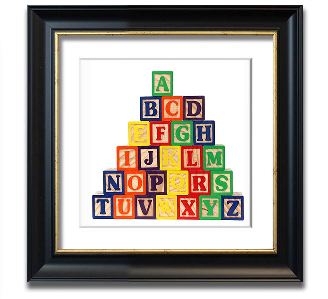 A stylish white framed print featuring colorful alphabet blocks, perfect for children's decor.