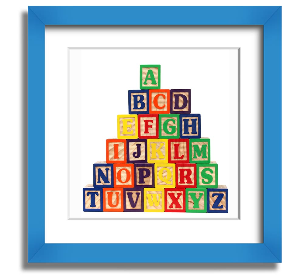 A stylish white framed print featuring colorful alphabet blocks, perfect for children's decor.