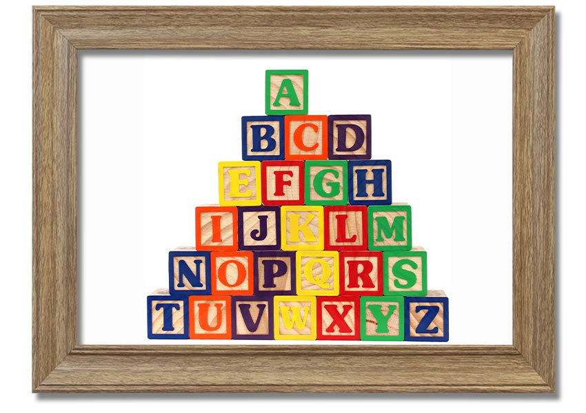 A beautifully framed print of white alphabet blocks, showcasing letters in a playful design, perfect for nursery decor.