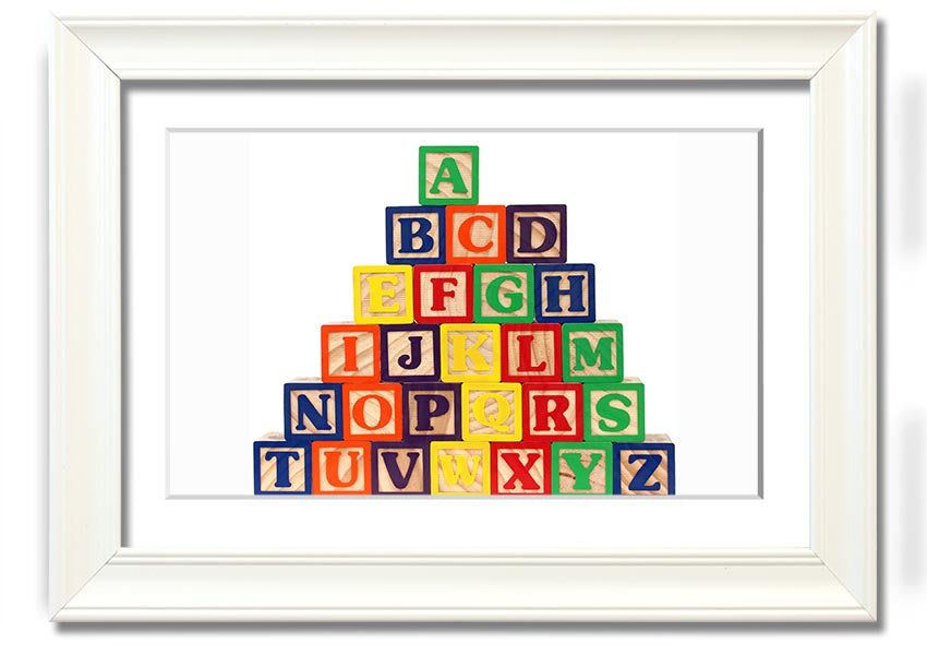 A beautifully framed print of white alphabet blocks, showcasing letters in a playful design, perfect for nursery decor.