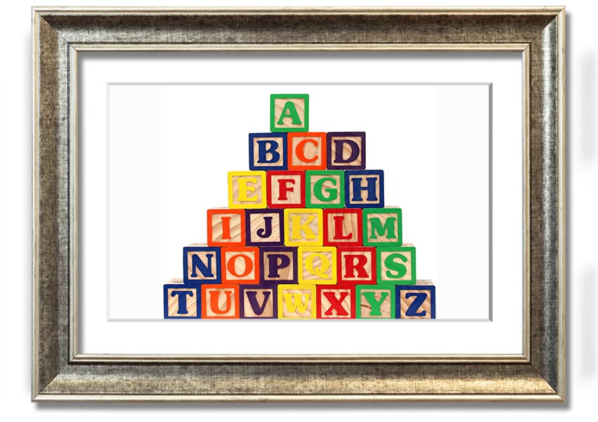 A beautifully framed print of white alphabet blocks, showcasing letters in a playful design, perfect for nursery decor.