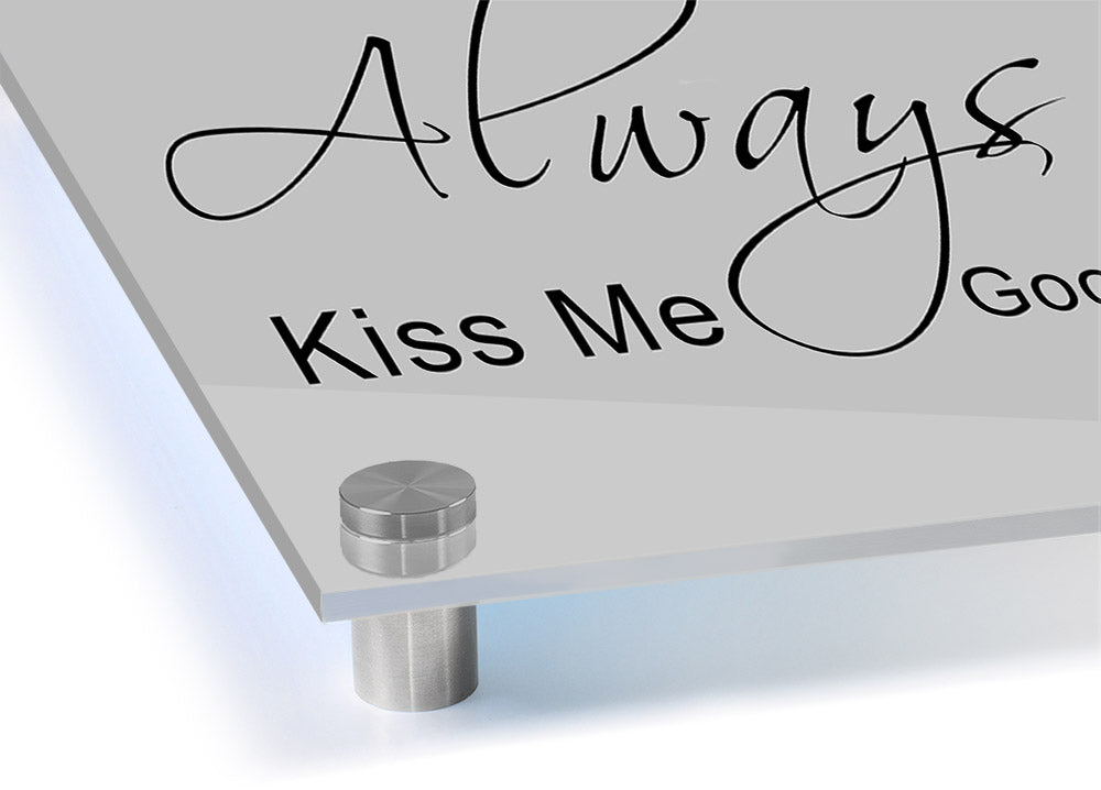 Always Kiss Me Goodnight 2 Grey acrylic print on a wall, showcasing a heartfelt message in elegant typography.