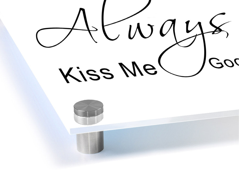 Always Kiss Me Goodnight 2 White acrylic print on a wall, showcasing its vibrant design and sleek finish.