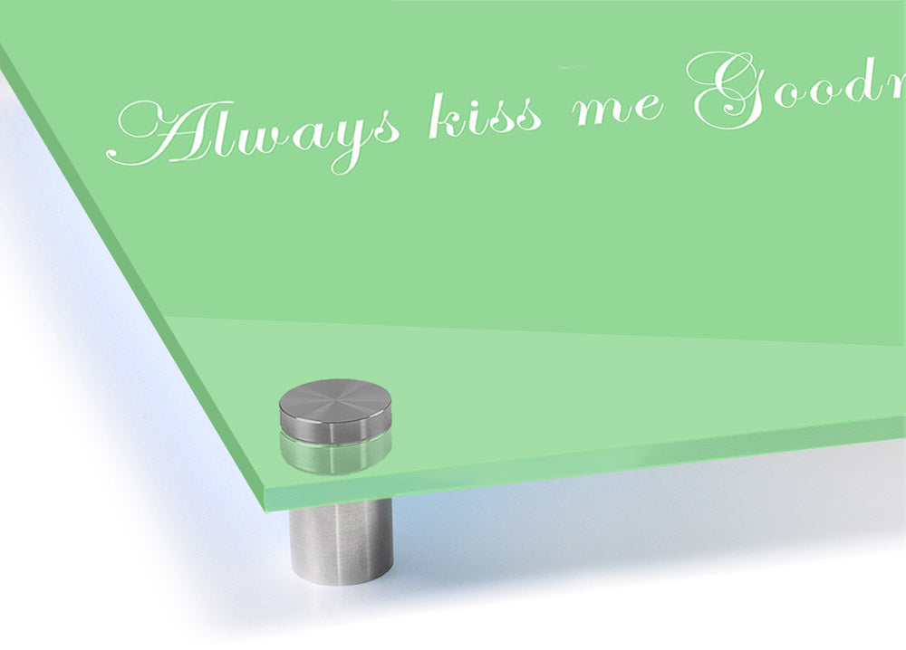 Always Kiss Me Goodnight Green acrylic print on a wall, showcasing vibrant green colors and modern design.