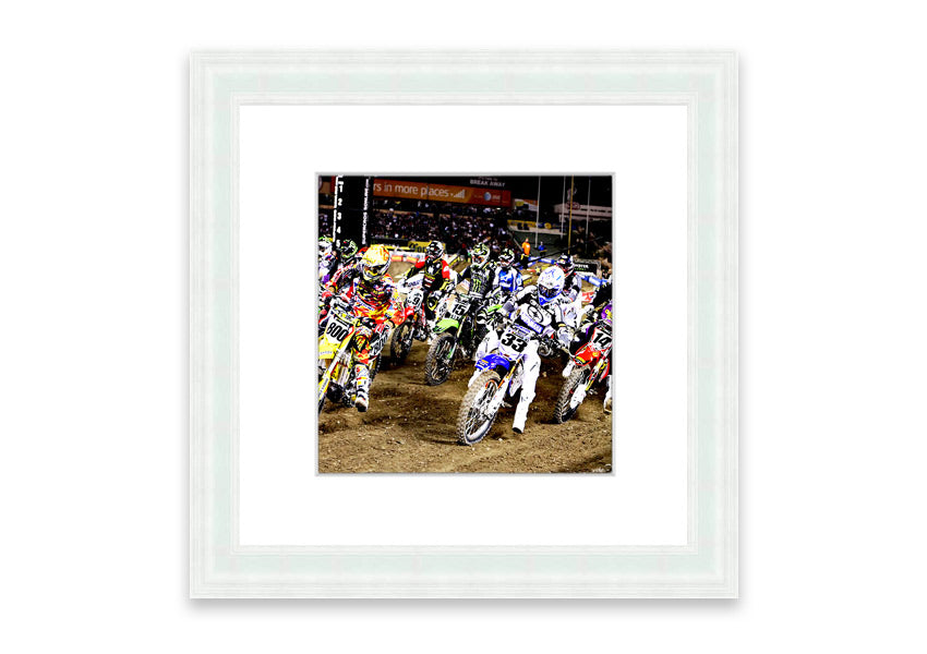 Ama Motorcross framed print showcasing vibrant motocross action, available in various frame colors.