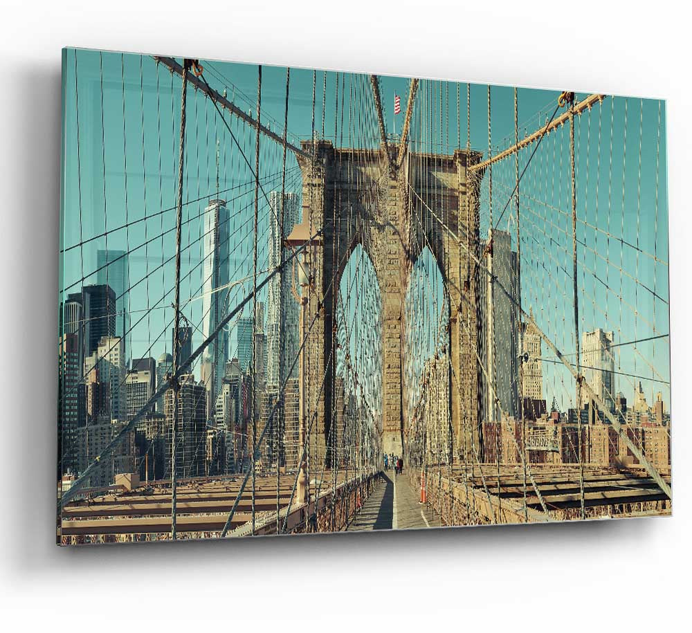 A modern glass print featuring the iconic NYC bridge, showcasing vibrant colors and intricate details.