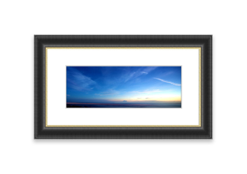 A beautifully framed print of the Amazing Sky over Cornwall, showcasing vibrant colors and stunning landscape details.