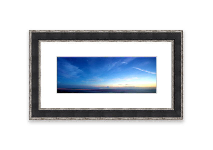 A beautifully framed print of the Amazing Sky over Cornwall, showcasing vibrant colors and stunning landscape details.