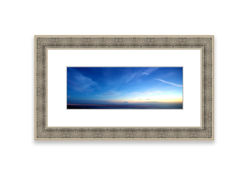 A beautifully framed print of the Amazing Sky over Cornwall, showcasing vibrant colors and stunning landscape details.