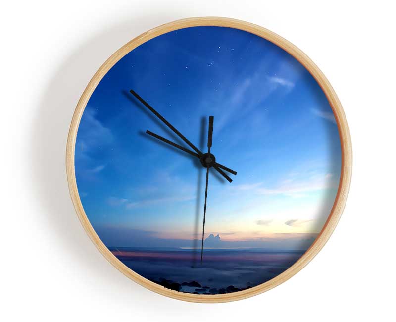 Amazing Sky bamboo clock with a round face, available in black, white, and natural colors, featuring a clear Plexiglas lens.