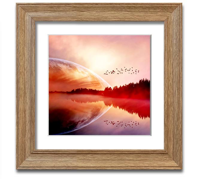 A beautifully framed print of a serene sunrise over a tranquil lake, showcasing vibrant colors and a peaceful atmosphere.