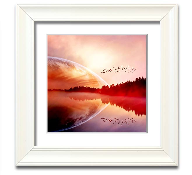 A beautifully framed print of a serene sunrise over a tranquil lake, showcasing vibrant colors and a peaceful atmosphere.