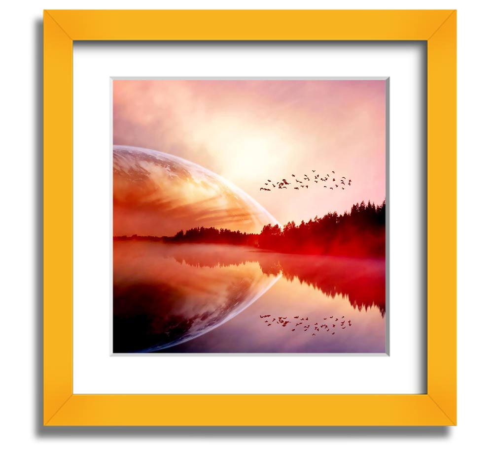 A beautifully framed print of a serene sunrise over a tranquil lake, showcasing vibrant colors and a peaceful atmosphere.